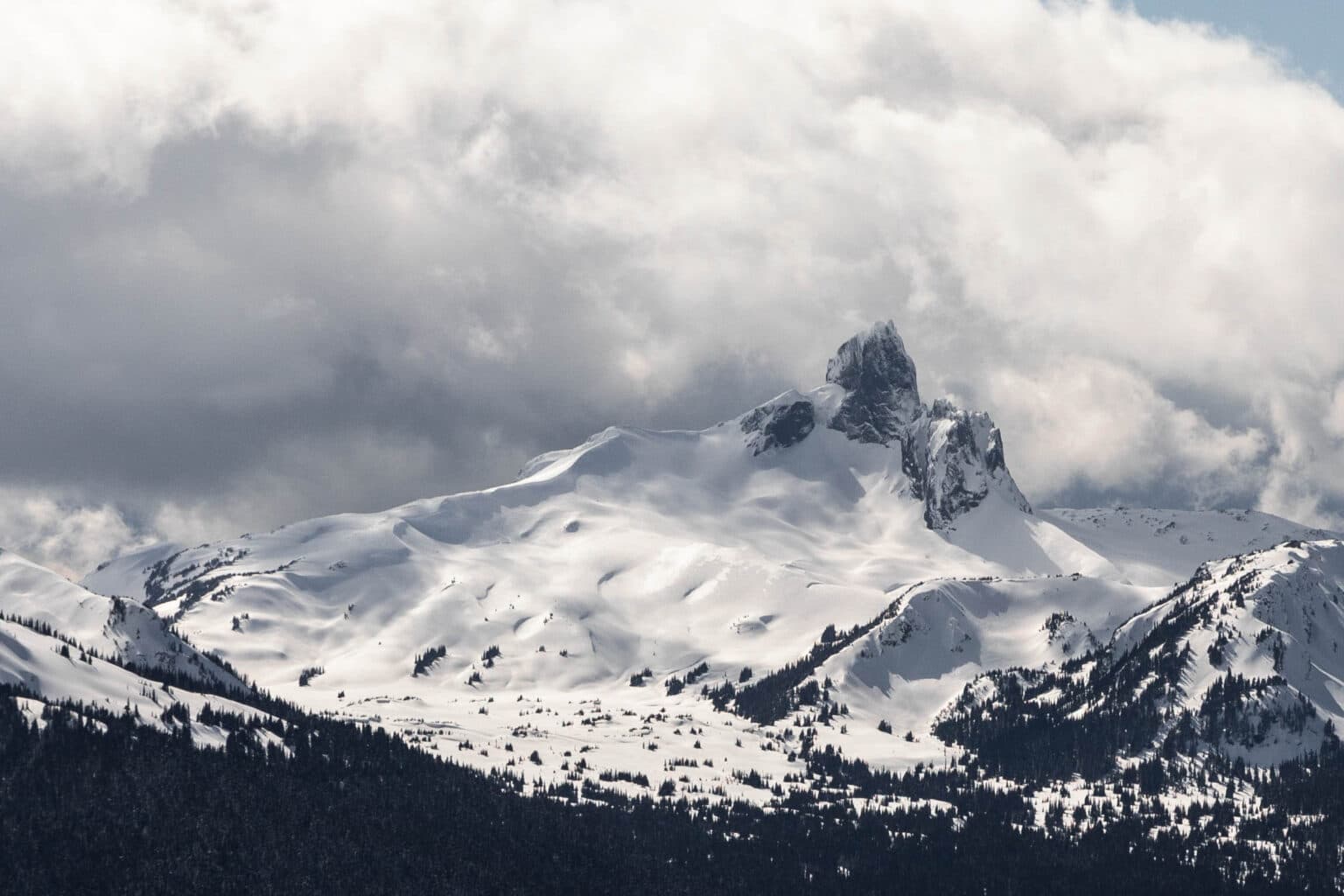 Black Tusk under heavy cloud, seen from the Oboe route in Garibaldi Park.